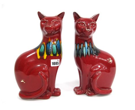 A Pair of Poole Pottery Cats, in the red Delphis designs with turquoise, ochre and black bands, printed marks and factory lab