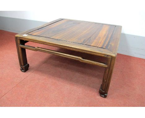 A XX Century Chinese Square Shaped Low Table, with panelled top and shaped rails on square scroll supports, 33cm high, 73cm w