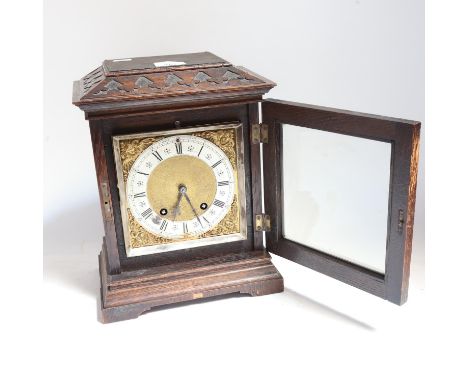 An early 20th century oak-cased 8-day mantel clock, by S Smith &amp; Son of London, brass dial with silvered chapter ring and