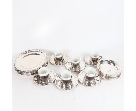 A set of 6 WMF plated coffee can holders and saucers, with Rosenthal ceramic inserts, a set of 10 WMF plated small dishes, an