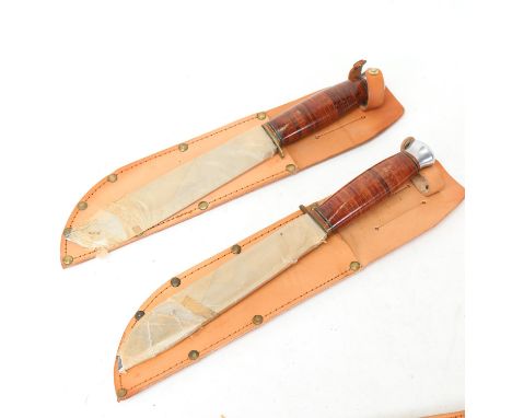 2 Vintage unused hunting knives with leather sheaths 