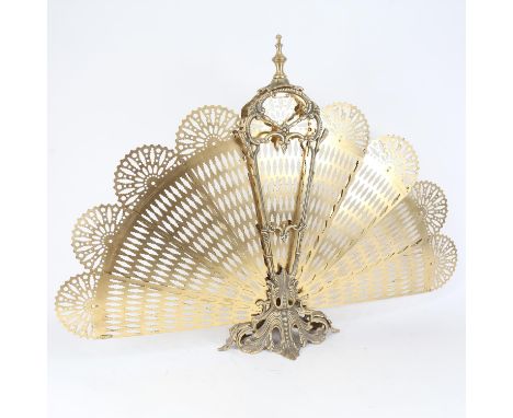 A reproduction brass peacock firescreen, H60cm 