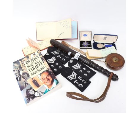 A Metropolitan Police truncheon, Police Long Service and Good Conduct medal, 2 pairs of epaulettes with badges, silver and en