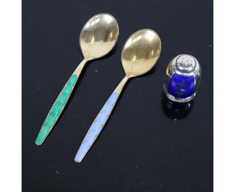 A sterling silver and blue enamel pepperette, by Volmer Bamner, and a pair of silver and enamel presentation spoons 