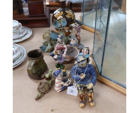 Various Studio pottery, including Winchcombe figures, slipware flagon, Celtic dragon etc 
