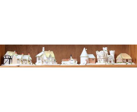 A shelf of 9 Coalport Cottages, boxed 