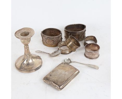 A group of silverware, to include a pair of sterling silver bangles, napkin rings, a caddy spoon, a cigarette case etc, 7.4 w
