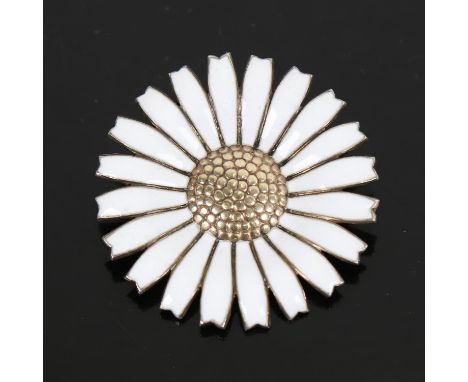 ANTON MICHELSEN - a silver-gilt and white enamel daisy design brooch 