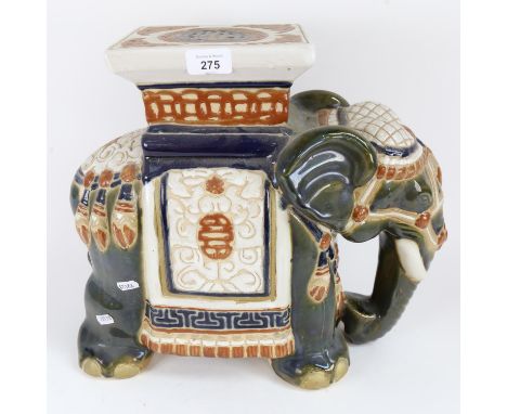 An Oriental glazed ceramic elephant garden seat, height 37cm 