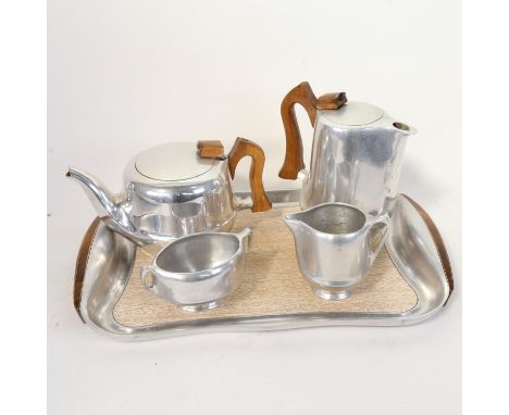 A Vintage Piquot aluminium tea service, comprising teapot, water jug, sugar bowl, cream jug and tray (5) 