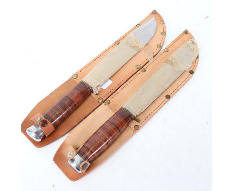 2 Vintage unused hunting knives with leather sheaths 