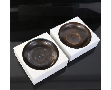 A pair of Troika ceramic dishes, artist's marks of Penny Black, 12cm x 12cm 