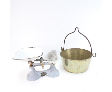 A brass jam pan, and an enamel kitchen scale and weights 