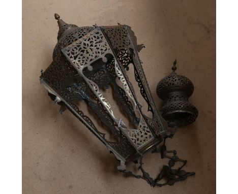 A Middle Eastern pierced brass octagonal lantern ceiling light fitting, lantern height 75cm 