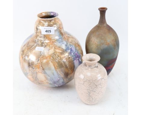 A Finland marble glaze ceramic vase, height 23cm, a Studio pottery metallic glaze narrow neck vase, and 1 other (3) 