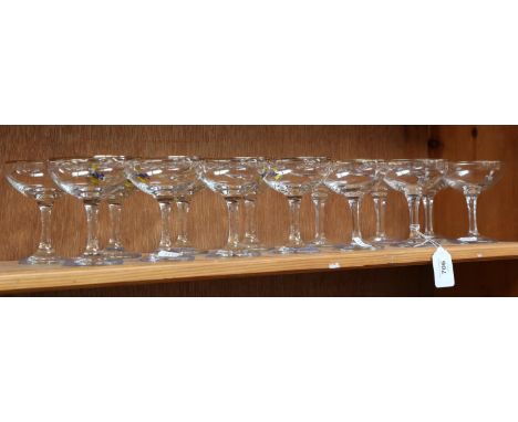 14 Vintage Babycham advertising glasses,&nbsp;8 glasses with a white figure and 6 with a blue figure