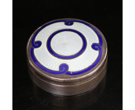 An Art Nouveau silver blue and white enamel circular pillbox, Birmingham 1910 