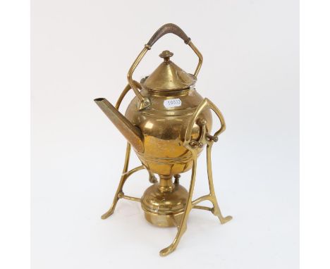 An Arts and Crafts brass spirit kettle on stand, height 31cm 