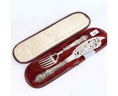 A Victorian embossed silver plated fish slice and fork, cased 