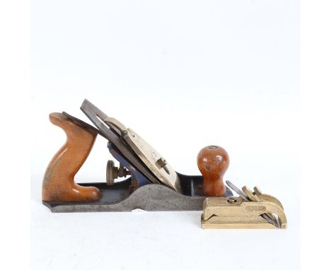 A Vintage brass-mounted WS woodworking smoothing plane, and a small Patsy no. 75 brass plane (2) 