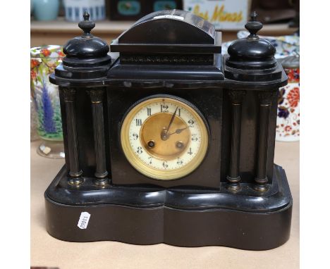 A large 19th century slate-cased architectural 8-day mantel clock, enamel dial with Arabic numerals and movement striking on 