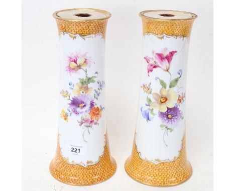 A pair of Nymphenburg tapered porcelain sleeve vases, hand painted and gilded decoration, model no. 647, height 27cm (1 resto