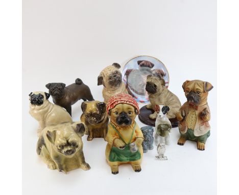 A collection of ceramic and other dog figures, including Pugs and a Jack Russell etc 