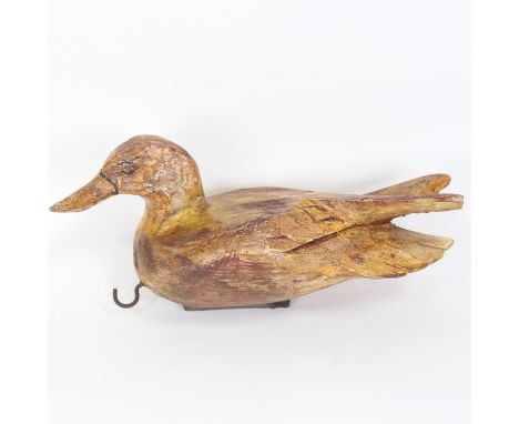A Vintage painted wood decoy duck, stamped G Gallagher, length 28cm 