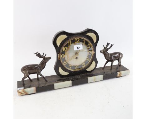 A French 2-colour marble mantel clock, surmounted by anodised metal stags, base length 52cm 