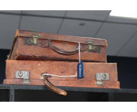 TWO VINTAGE LEATHER SUITCASES