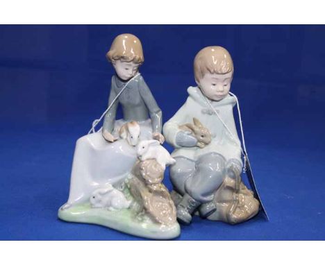 TWO NAO FIGURES OF CHILDREN
one depicting a boy with rabbits, the other depicting a girl with rabbits
