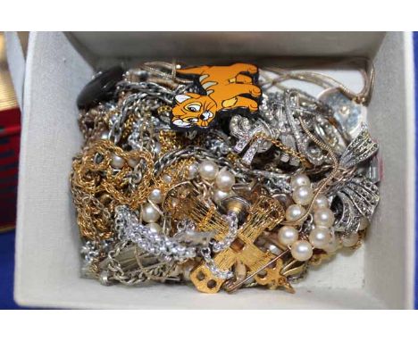 LOT OF COSTUME JEWELLERY
including faux pearls, beads, brooches, necklaces etc., inside a vintage tin and a fabric jewellery 