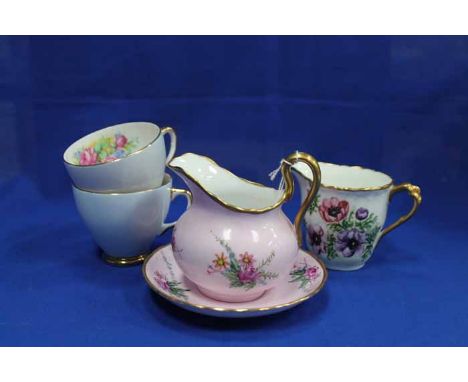 THREE PART TEASETS
comprising Tuscan with blush pink ground and initialled to base 'H.M.S'; together with hand-painted Parago