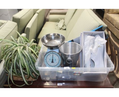 A set of scales and weights, a half point hand saw, a pair of Urban Jacks shoes size, various plants etc.