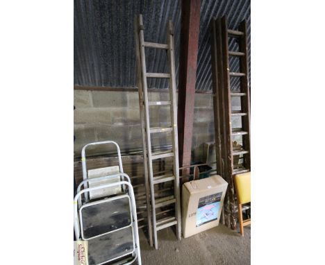 A wooden extending ladder