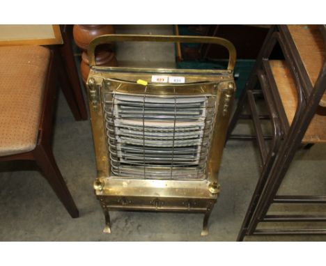 An Art Deco style brass electric fire, sold as collectors item