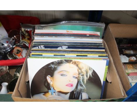 A box of various records to include Madonna, Tubular Bells, Electric Light Orchestra etc.