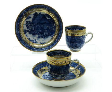 Blue and white decor with gilt, saucers are 13 cm. in diameter,
