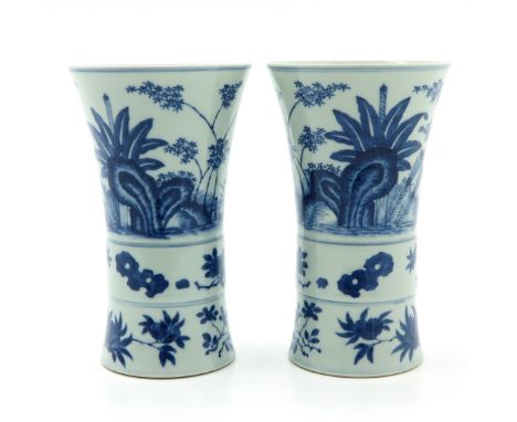Blue and white depicting scene in garden, marked with double ring and 6 characters, 19 cm. tall.