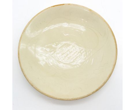 Probably Ting Yao,  depicting fish, marked on bottom with double ring and characters, 19 cm. in diameter, hairline in glaze.