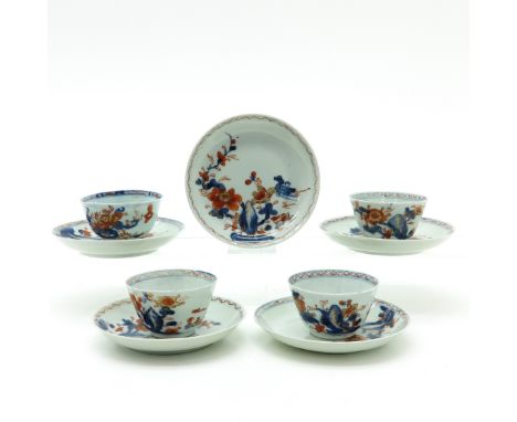 Including 4 cups and 5 saucers, Imari decor, saucers are 12 cm. in diameter, some with chip and hairline.