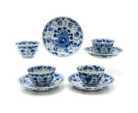 Blue and white floral decor, marked with double ring, saucers are 11 cm. in diameter, some with chip and hairline.