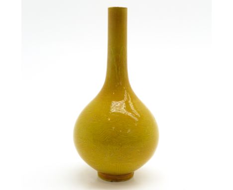 Yellow ground bottle vase with incised decoration of phoenixes, marked with double ring and 6 characters, 25 cm. tall.