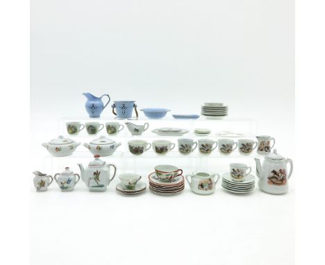 Porcelain and enamel, tallest is 14 cm.