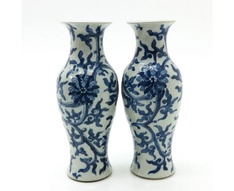 Blue floral decor, marked with double ring, 29 cm. tall.