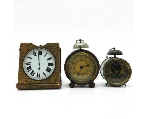 Including alarm clock, tallest is 17 cm.