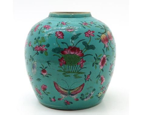 Light blue background with pink decor of flowers and butterflies, 22 cm. tall.