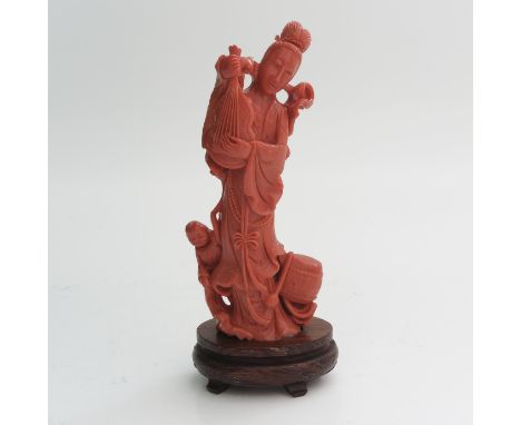 19th Century, China, depicting Quanyin holding a harp, 19 cm. tall, 390 gram.