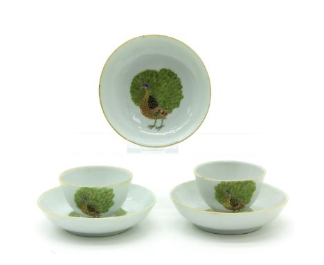 Peacock decor, saucers are 9 cm. in diameter, 2 with hairline in glaze.