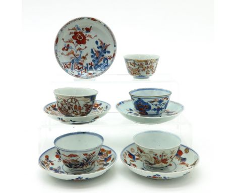 18th Century, Imari decor,  saucers are 12 cm. in diameter, some with chip and hairline.